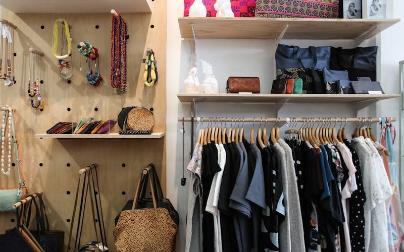 A warm, organized closet filled with curated clothing
